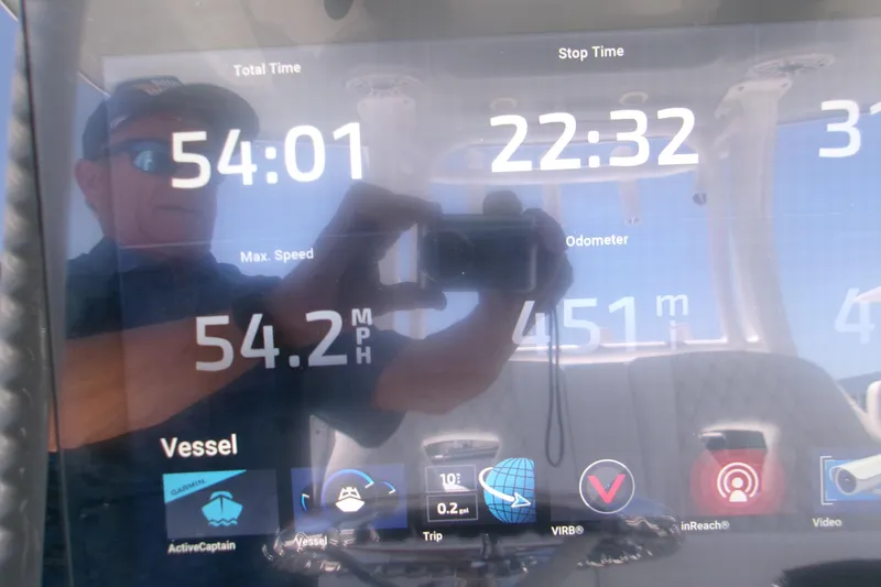 Slide: The Image of Display screen of a 2022 Sportsman Open 322 Center Console showing speed and trip data. - 15