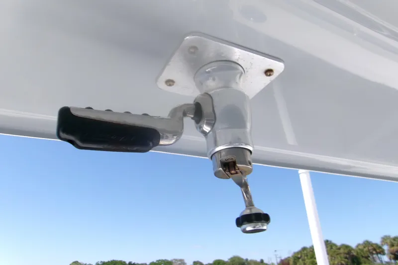 Slide: The Image of Close-up of a 2022 Sportsman Open 322 Center Console boat handle. - 20