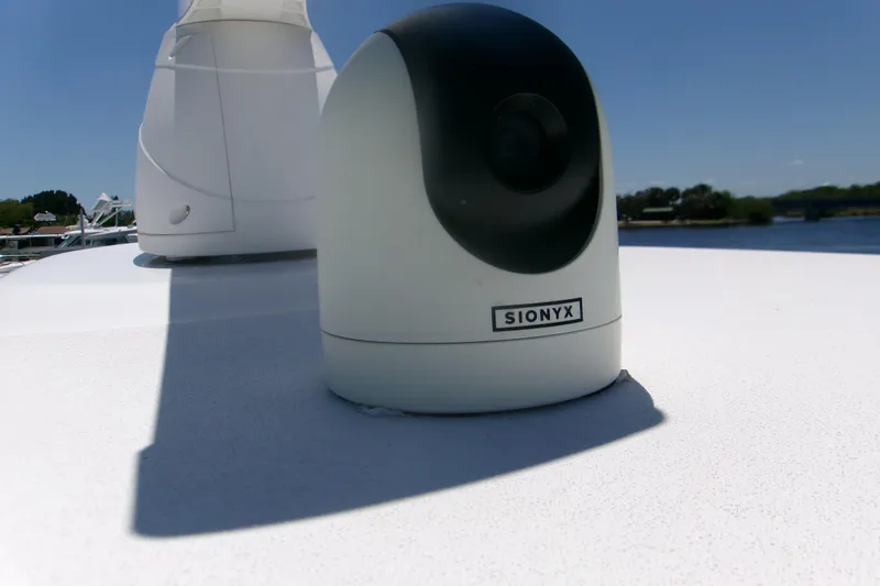 Slide: The Image of SIONYX camera on 2022 Sportsman Open 322 Center Console boat deck. - 21