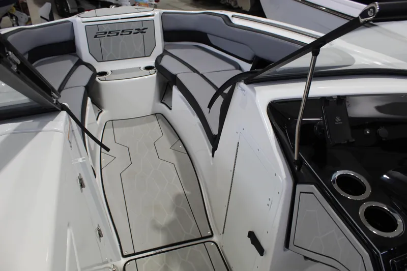 Slide: The Image of Interior view of 2026 Yamaha Boats 255XE, featuring sleek seating and modern design. - 11