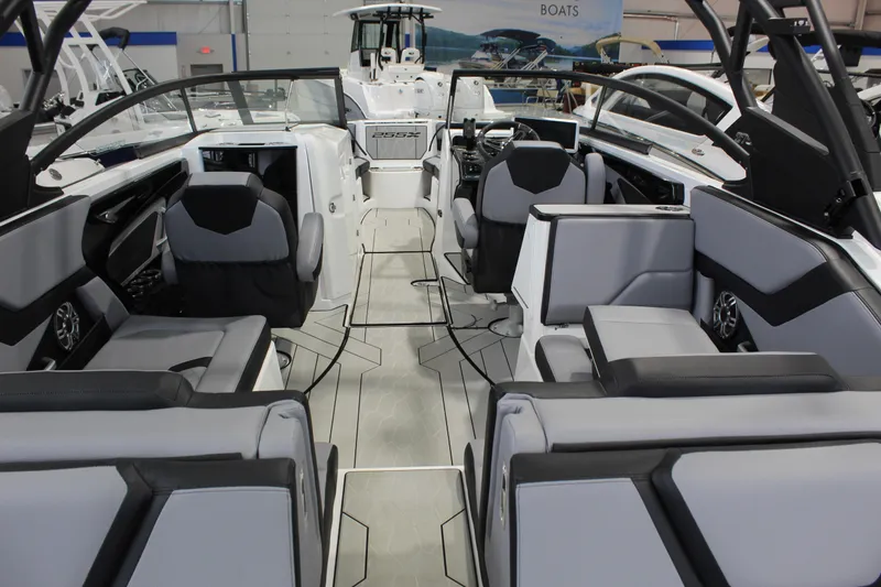 Slide: The Image of Interior of 2026 Yamaha Boats 255XE, featuring modern seating and sleek design. - 3