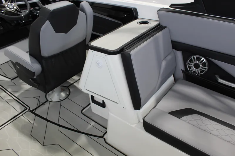 Slide: The Image of Interior of 2026 Yamaha Boats 255XE, featuring sleek seating and modern design elements. - 5