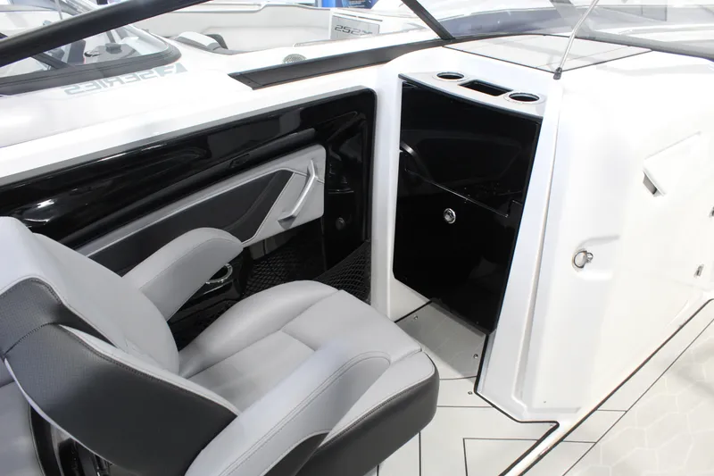 Slide: The Image of Interior of 2026 Yamaha Boats 255XE, featuring sleek seating and modern design elements. - 9