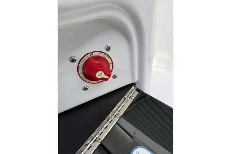 Slide: The Image of Red control knob on 2022 Seapro 239 DLX boat panel. - 16