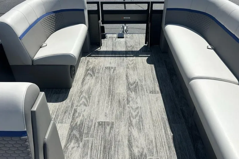 Slide: The Image of Interior of 2023 Angler Qwest 8524 Pro Family Fish Triple Tube boat with gray seating. - 13