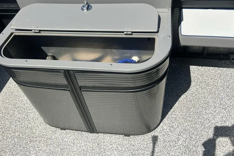 Slide: The Image of Livewell compartment on 2023 Angler Qwest 8524 Pro Family Fish Triple Tube boat. - 17