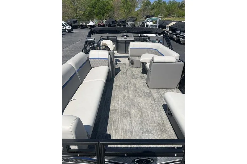Slide: The Image of 2023 Angler Qwest 8524 Pro Family Fish Triple Tube boat interior with spacious seating. - 7