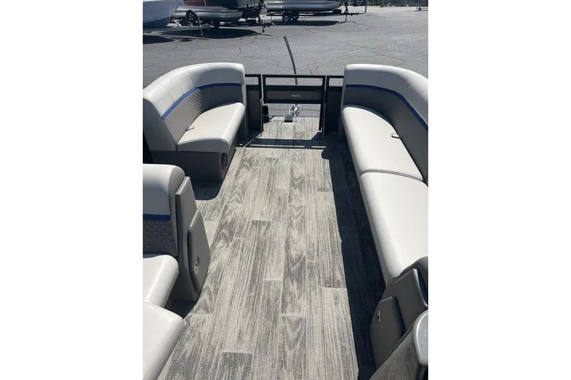 Slide: The Image of 2023 Angler Qwest 8524 Pro Family Fish Triple Tube interior with spacious seating. - 9