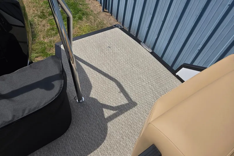 Slide: The Image of Deck area of 2026 Evotti 523QL boat with railing and seating. - 26