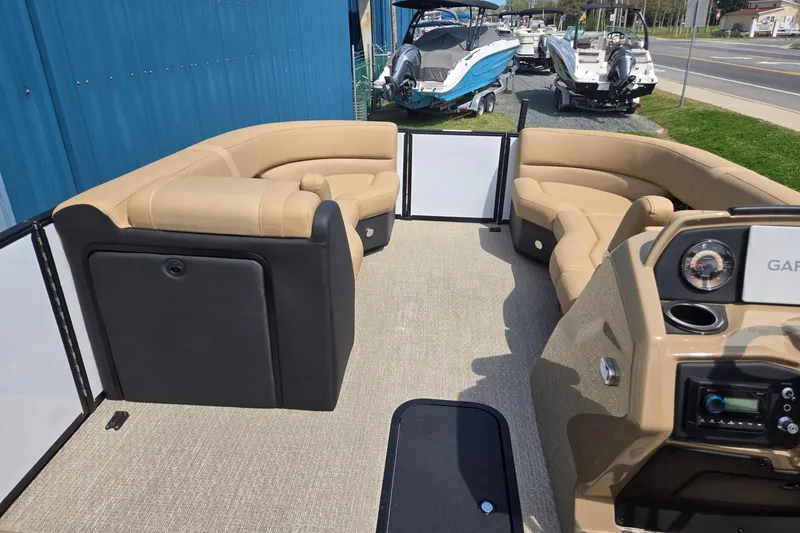 Slide: The Image of Interior of 2026 Evotti 523QL boat with beige seating and modern dashboard. - 34
