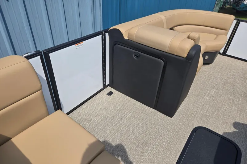 Slide: The Image of Interior of 2026 Evotti 523QL boat with beige seating and blue wall background. - 36