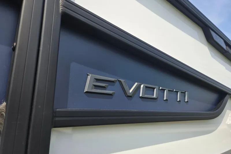 Slide: The Image of Close-up of 2026 Evotti 523QL logo on vehicle exterior. - 41