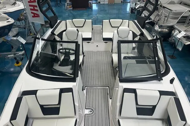 Slide: The Image of 2025 Yamaha Boats 222SE interior with sleek seating and modern design. - 21