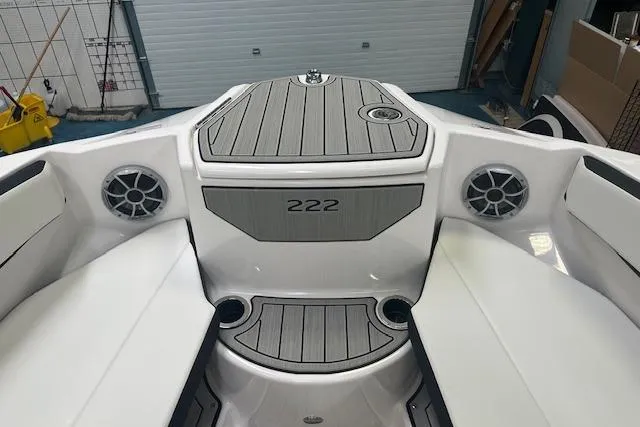 Slide: The Image of 2025 Yamaha Boats 222SE interior with sleek seating and modern design. - 23