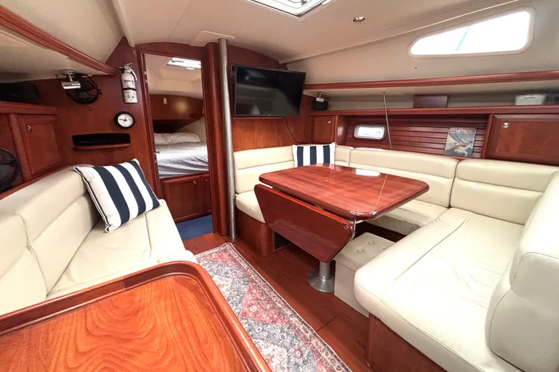 Slide: The Image of Luxurious interior of a 2011 Hunter 39 yacht with elegant wood finishes. - 17