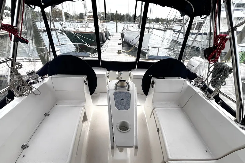 Slide: The Image of Cockpit view of 2011 Hunter 39 sailboat docked at marina. - 27