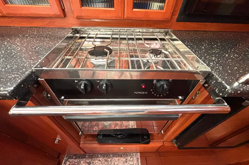 Slide: The Image of Stainless steel stove in a 2011 Hunter 39 yacht kitchen. - 6