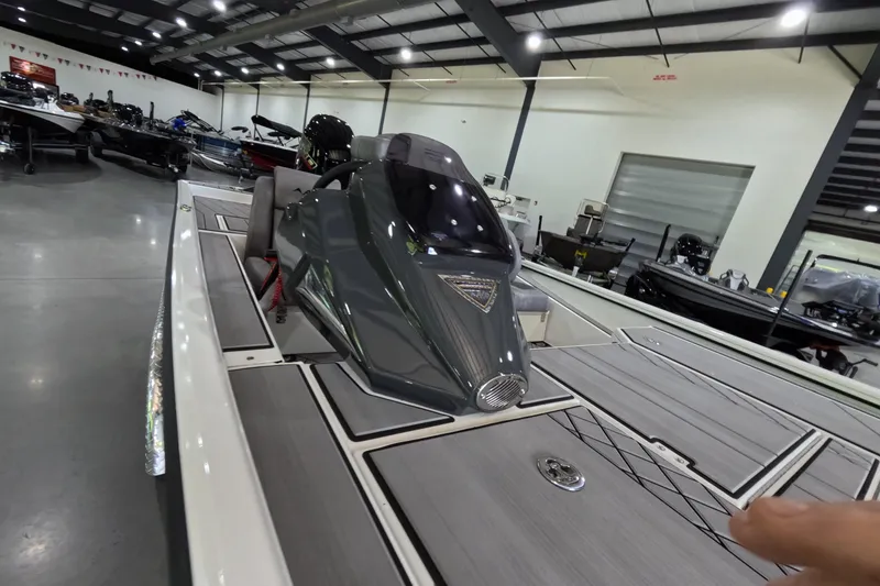 Slide: The Image of 2026 Avid 20 Vertex boat in showroom, featuring sleek design and modern technology. - 10