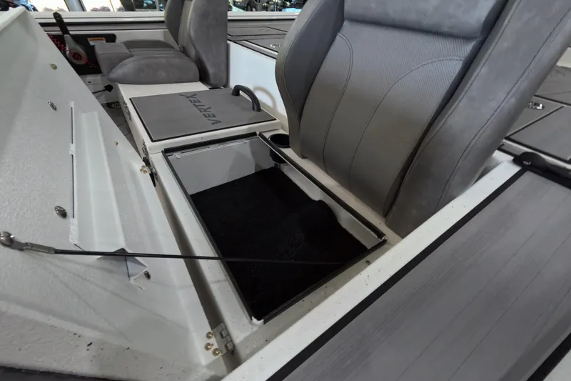 Slide: The Image of Interior of 2026 Avid 20 Vertex boat showing storage compartment and seating. - 15
