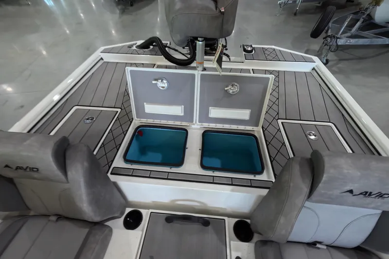 Slide: The Image of 2026 Avid 20 Vertex boat interior with storage compartments and seating. - 19