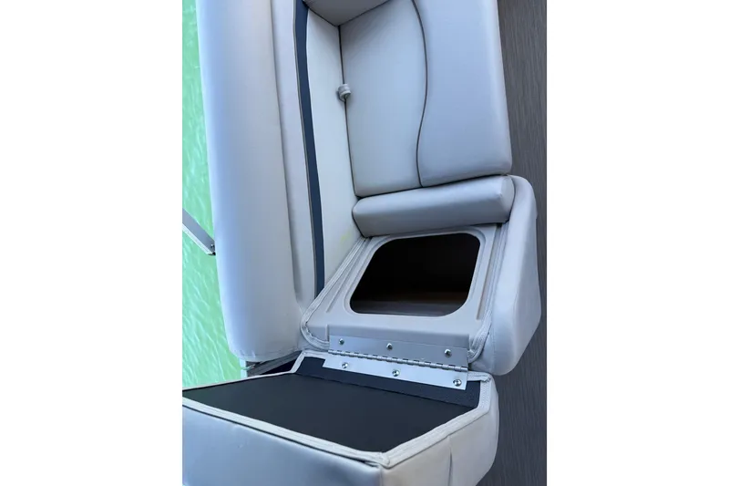 Slide: The Image of 2017 Bennington 21 SLX boat seat with open storage compartment. - 35