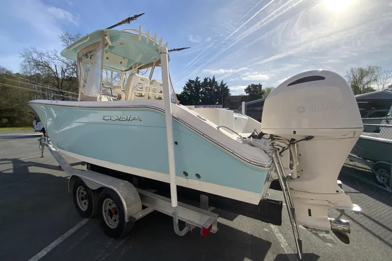 Slide: The Image of 2017 Cobia 277 Center Console boat on trailer, featuring Yamaha outboard motor. - 7