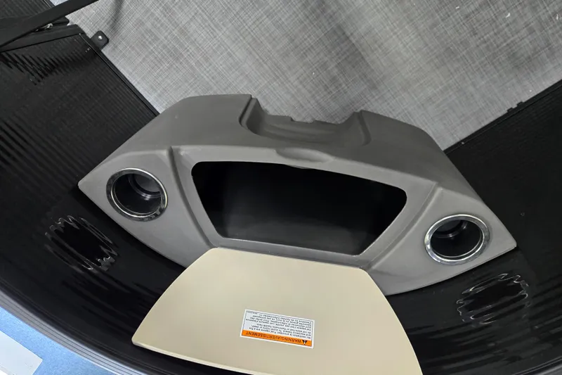 Slide: The Image of Interior view of 2026 Princecraft Brio 17 Electric boat dashboard with speaker system. - 16