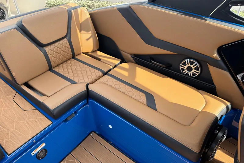 Slide: The Image of Luxurious interior seating of 2026 Yamaha Boats 255XD with premium upholstery and speaker system. - 14