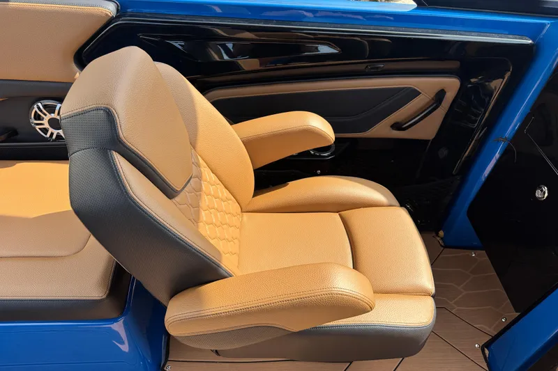 Slide: The Image of Luxurious tan seating in 2026 Yamaha Boats 255XD, featuring sleek design and premium materials. - 18