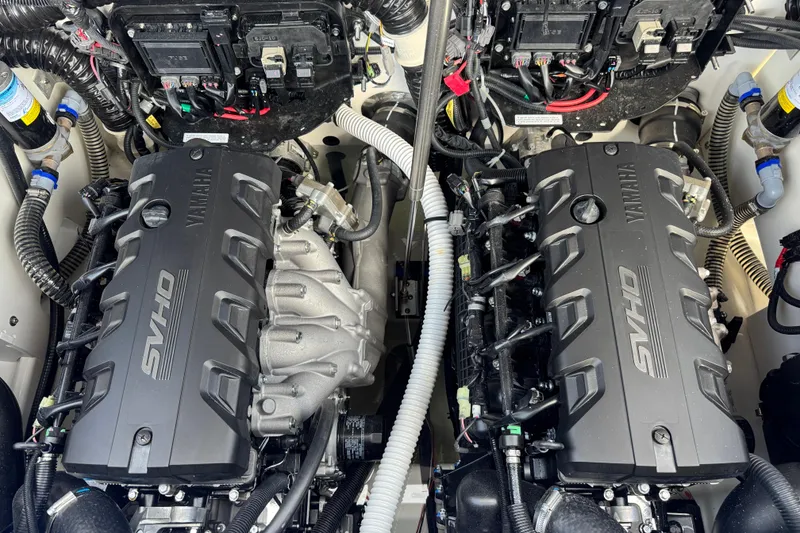 Slide: The Image of Twin Yamaha SVHO engines in a 2026 Yamaha Boats 255XD model. - 27