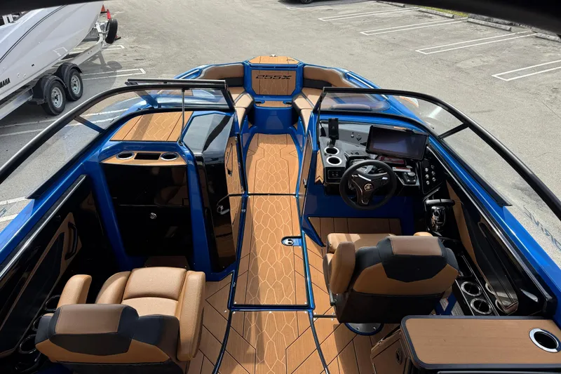 Slide: The Image of 2026 Yamaha Boats 255XD interior with modern dashboard, seating, and sleek design. - 7