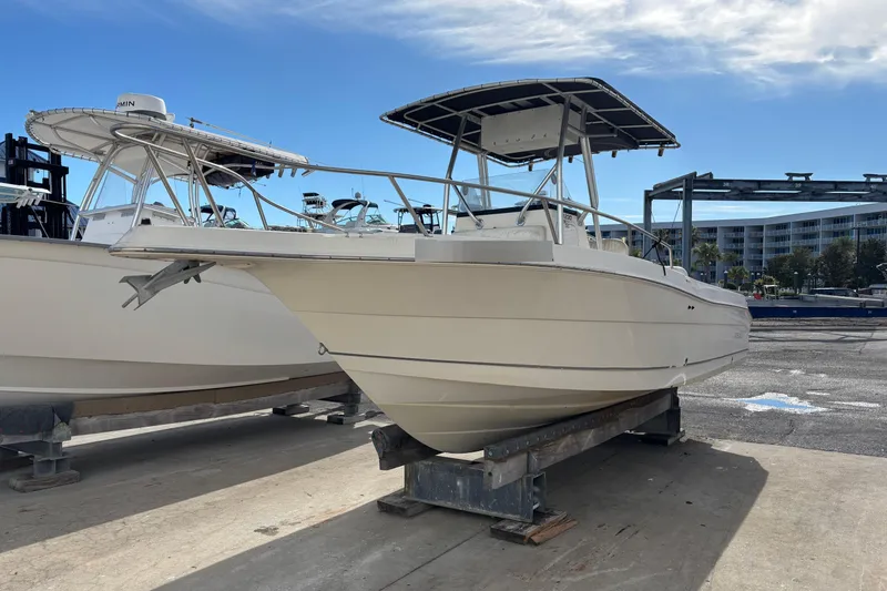The Image of 2003 Robalo R230 Center Console boat on a dock. - 1