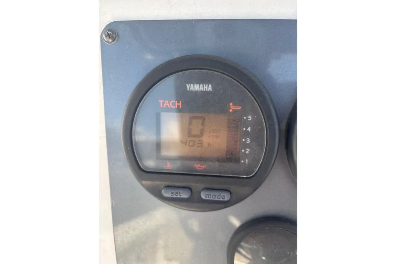 Slide: The Image of Yamaha tachometer on 2003 Robalo R230 Center Console boat, displaying 403 hours. - 8
