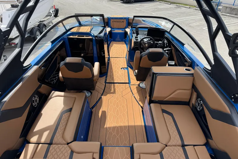 Slide: The Image of 2026 Yamaha Boats 255XD interior with luxurious seating and modern dashboard design. - 6
