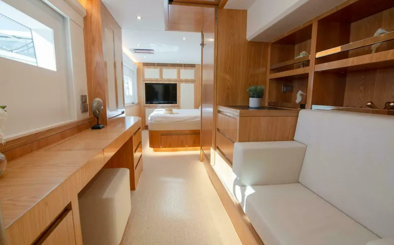Slide: The Image of Luxurious interior of ILIAD 53S yacht, featuring modern wood finishes and elegant furnishings, 2026 model. - 35