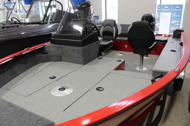 Slide: The Image of 2026 G3 Angler V178 C boat interior with seating and storage compartments. - 2