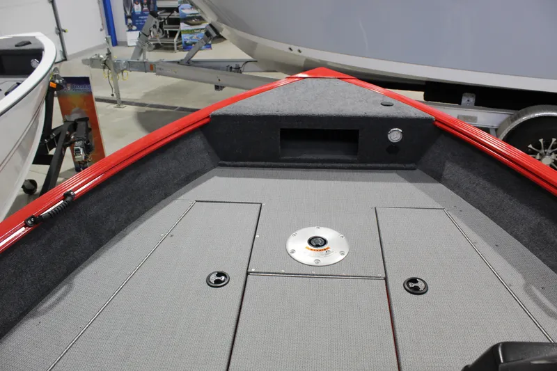 Slide: The Image of 2026 G3 Angler V178 C boat interior with red trim and storage compartments. - 3