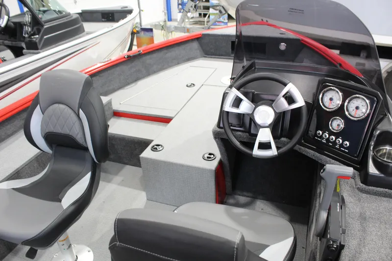Slide: The Image of 2026 G3 Angler V178 C boat interior with steering wheel and seating. - 4