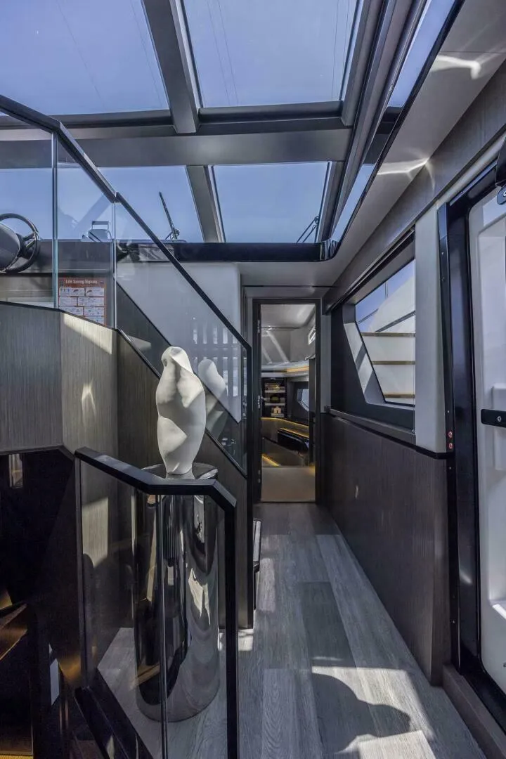 Slide: The Image of Luxurious interior of 2026 Pearl 82 yacht with skylight and modern decor. - 20