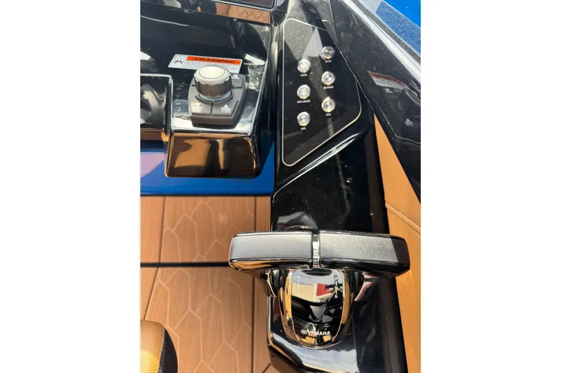 Slide: The Image of Control panel of 2026 Yamaha Boats 255XD with sleek design and advanced features. - 22