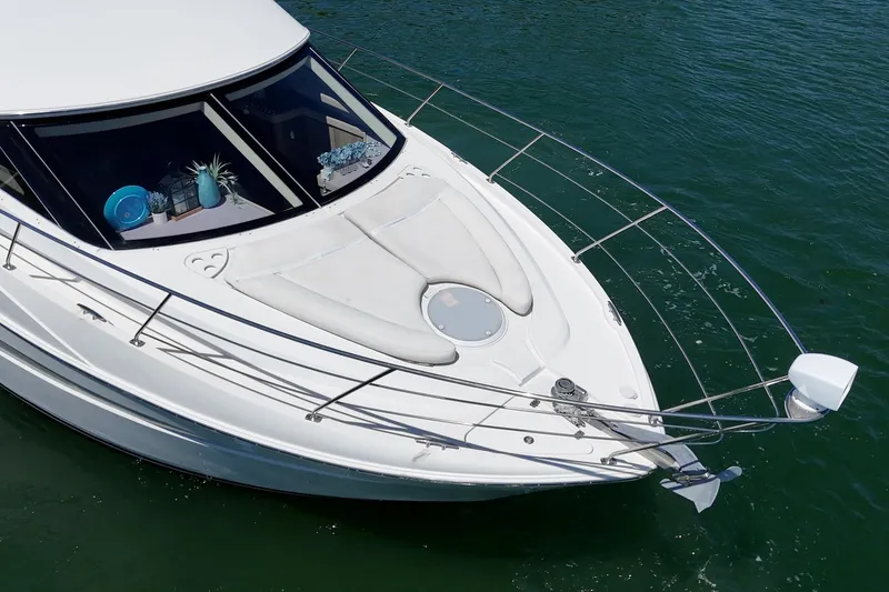 Slide: The Image of 2007 Carver 43 Motor Yacht bow view on calm water. - 10