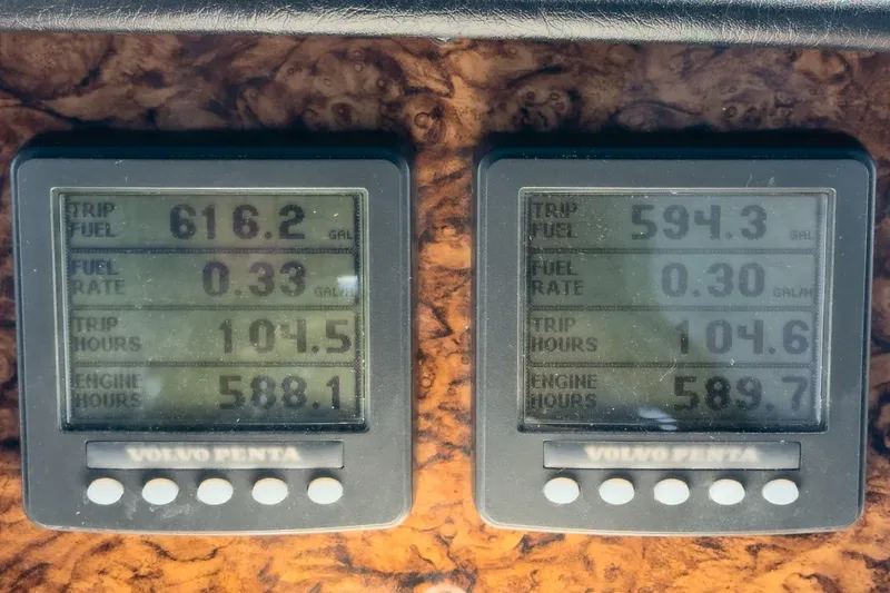 Slide: The Image of Digital displays on a 2007 Carver 43 Motor Yacht showing fuel and engine data. - 26