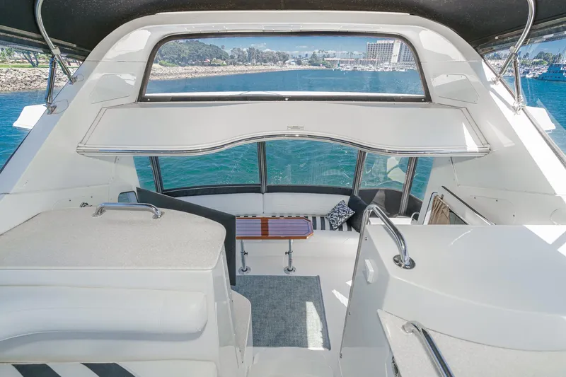 Slide: The Image of Interior view of 2007 Carver 43 Motor Yacht with scenic ocean backdrop. - 27