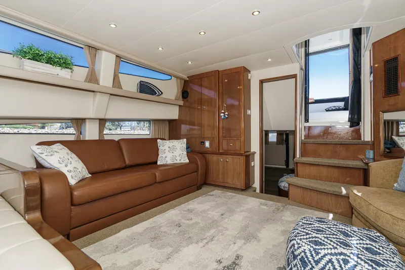 Slide: The Image of Luxurious interior of 2007 Carver 43 Motor Yacht with elegant seating and modern decor. - 31