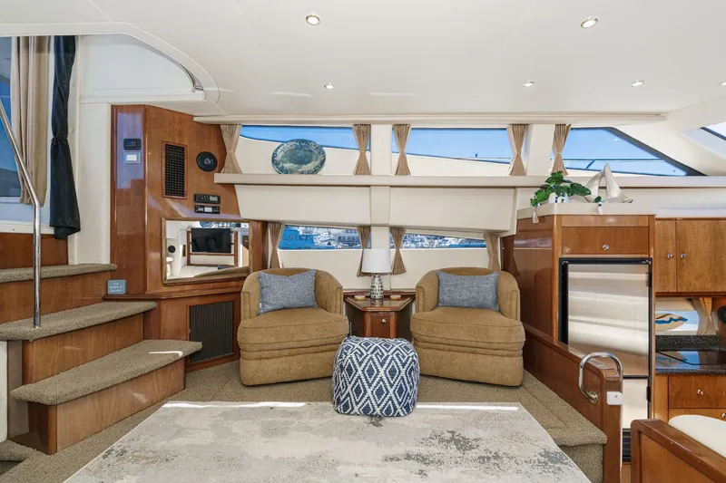 Slide: The Image of Luxurious interior of 2007 Carver 43 Motor Yacht with plush seating and elegant decor. - 35