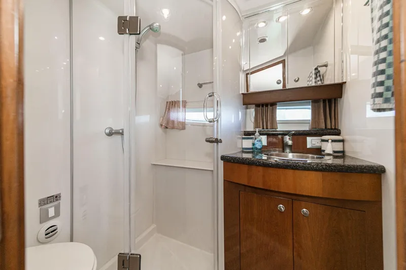 Slide: The Image of Luxurious bathroom in 2007 Carver 43 Motor Yacht with shower and vanity. - 56