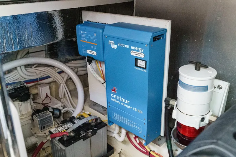 Slide: The Image of Engine room of 2007 Carver 43 Motor Yacht with Victron Energy battery charger. - 63