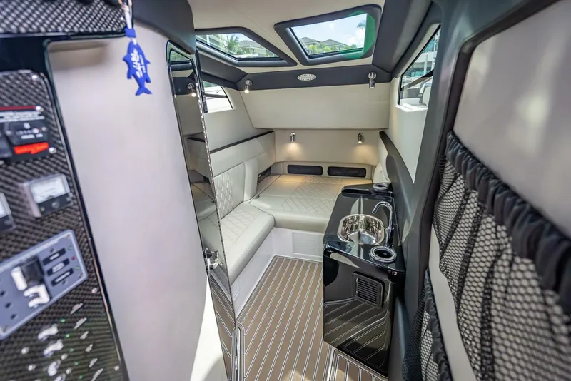 Slide: The Image of Luxurious interior of 2023 Nor-Tech 500 Sport boat with modern amenities and sleek design. - 34