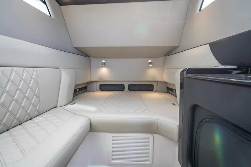 Slide: The Image of Luxurious interior of 2023 Nor-Tech 500 Sport boat with elegant seating and modern lighting. - 35
