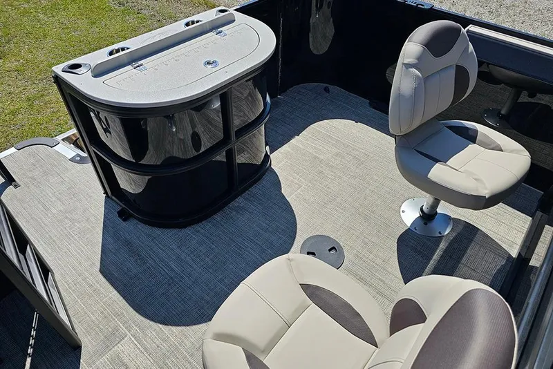 Slide: The Image of 2026 Bentley Pontoons Fish 240 4-Point interior with swivel seats and fishing station. - 11